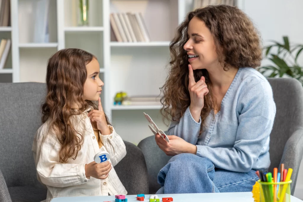 Nanny and child engaged in educational play, fostering trust and learning